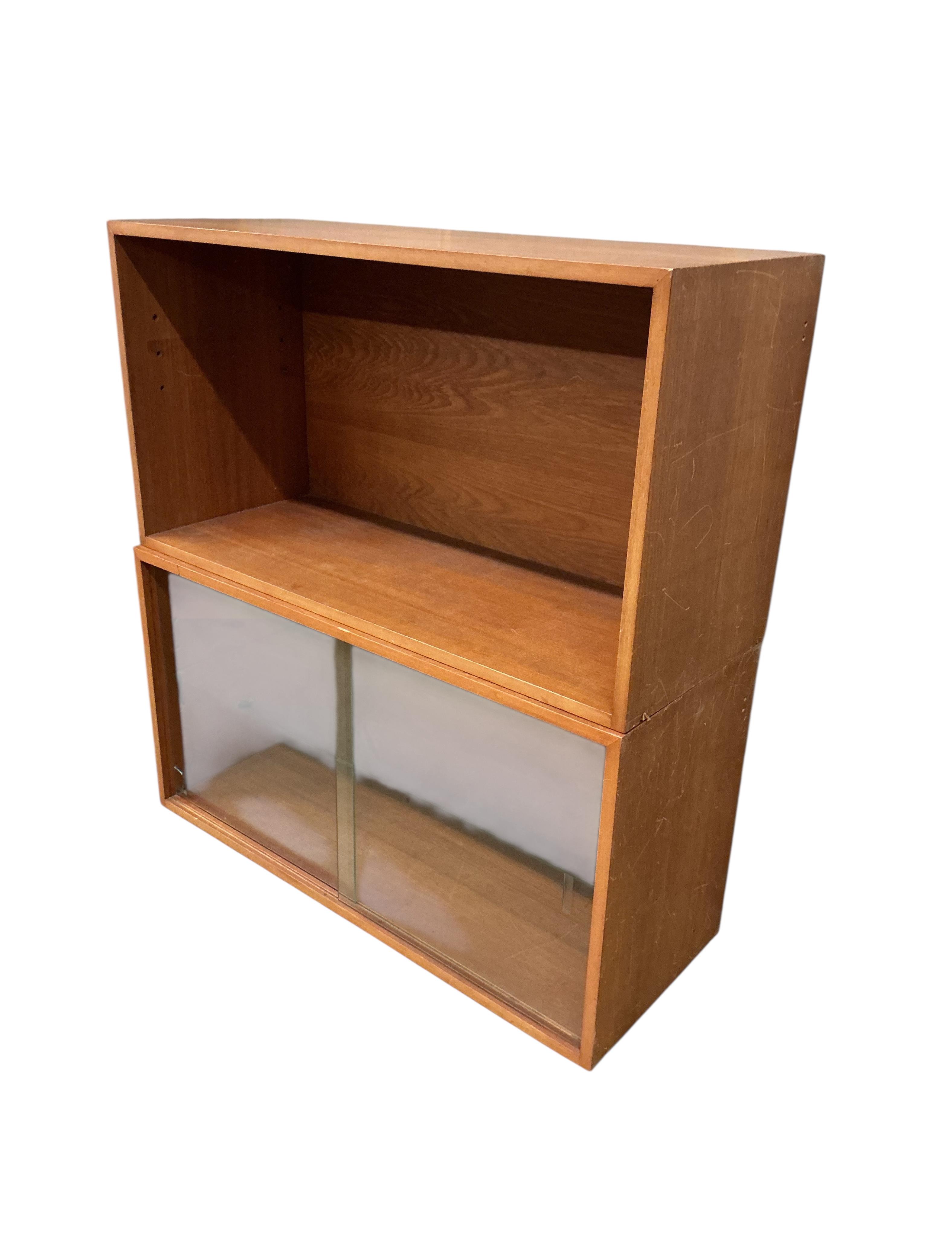 A Ladderax cupboard unit with glass door and a shelf and a unit, width 89cm, depth 35cm, height 48cm